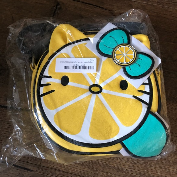 Loungefly Handbags - FREE SHIPPING! RARE HELLO KITTY-Loungefly (NWT) Lemon Crossbody Handbag